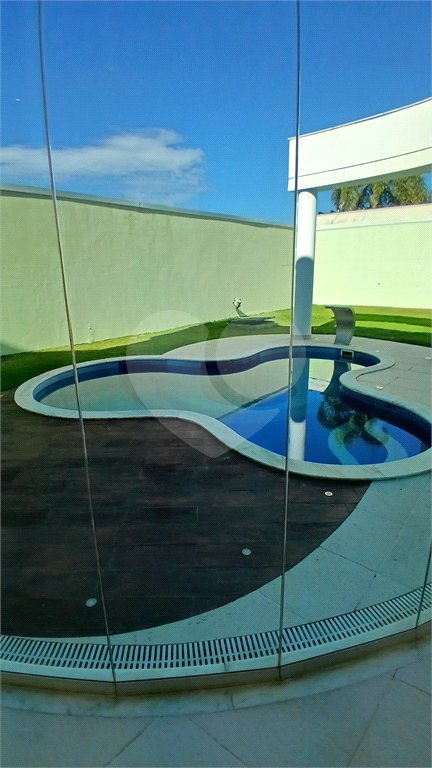 Casa à venda com 3 suítes no condomínio Figueira Garden, Atibaia - SP