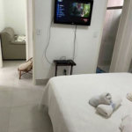 Apartamento Residencial à venda, Jardim Três Marias, Guarujá - AP1018.