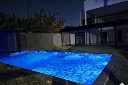 Casa à venda com 4 suítes no condomínio Park Lane, Guarujá - SP