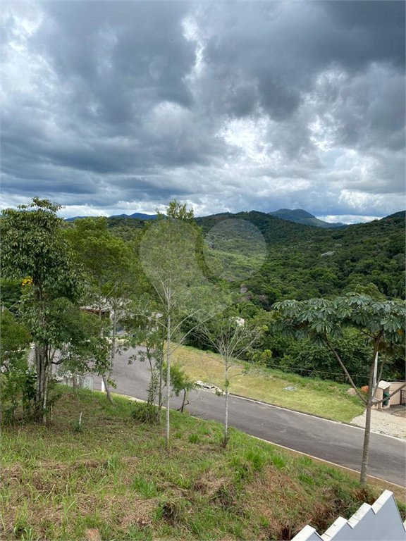 Casa à venda com 4 suítes no condomínio Reserva Ibirapitanga Ii, Santa Isabel - SP