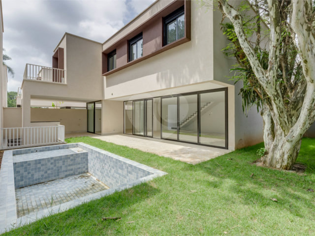 Casa à venda com 4 suítes no condomínio Garda, São Paulo - SP