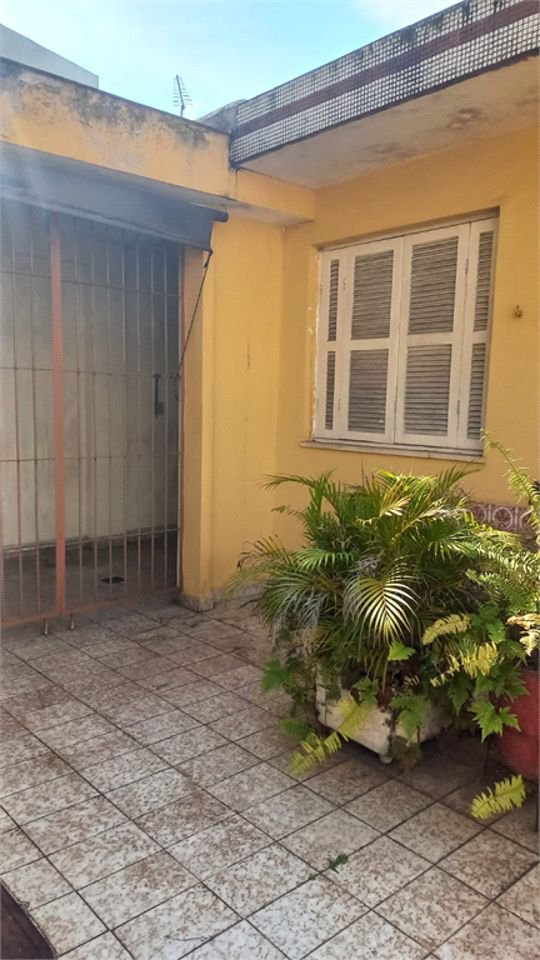 Casa com 3 dormitórios, 249 m² - venda por R$ 3.200.000,00 ou aluguel por R$ 21.351,00 - Encruzilhada - Santos/SP