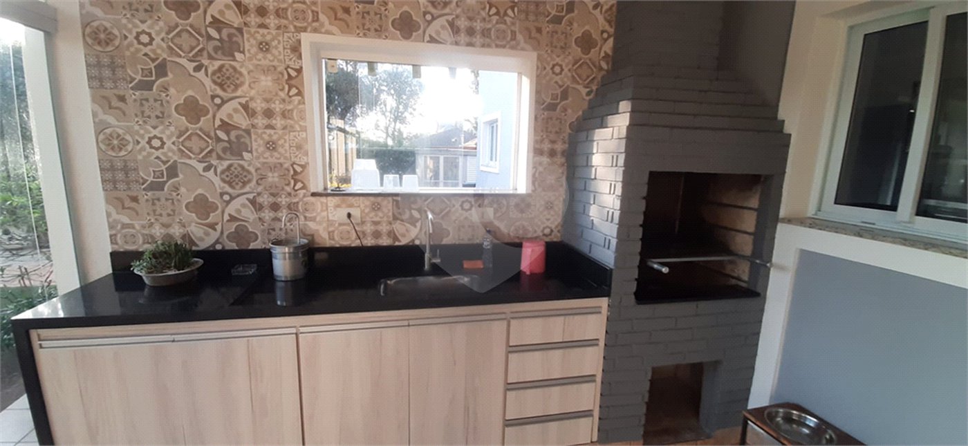Casa à venda com 4 suítes no condomínio Suíça da Cantareira, Mairiporã - SP