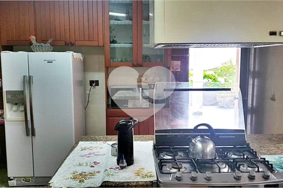 Casa à venda com 4 suítes no condomínio Alpes da Cantareira, Mairiporã - SP