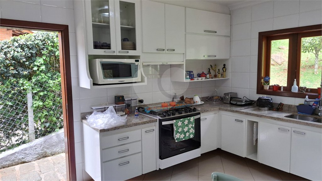 Casa à venda com 6 quartos, sendo 4 suítes, no condomínio Alpes da Cantareira, Mairiporã - SP