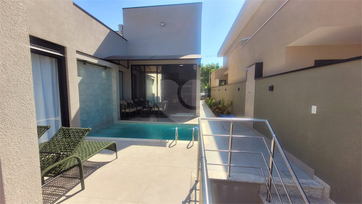 Casa à venda com 4 suítes no condomínio Sta Morriz, Campinas - SP