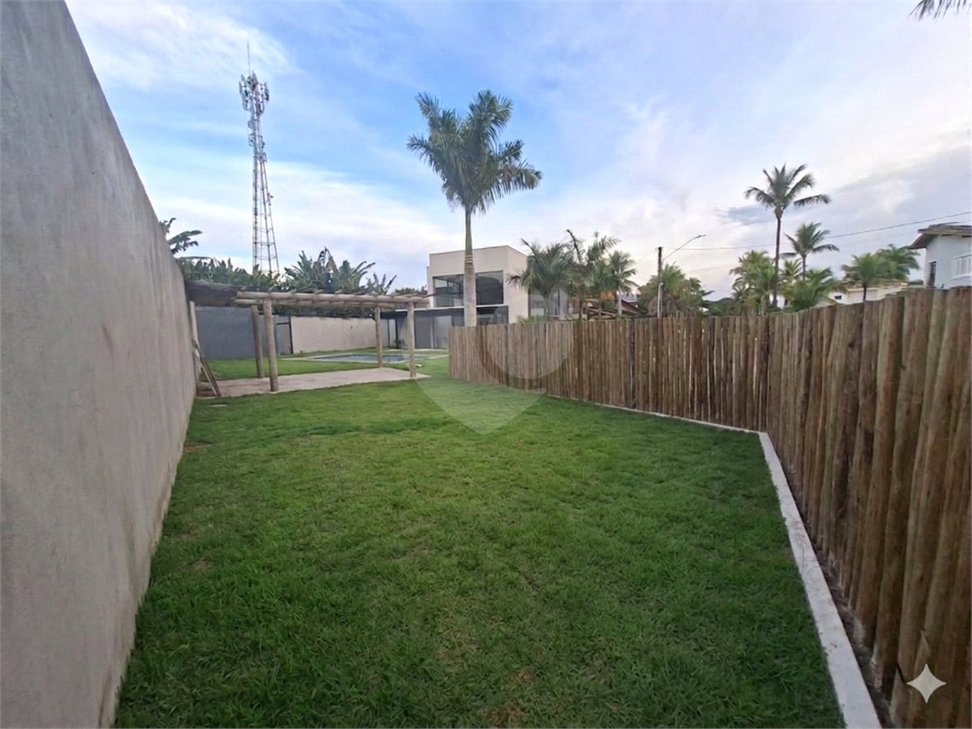 Casa à venda com 4 suítes no condomínio Park Lane, Guarujá - SP