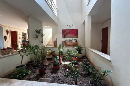 Casa à venda com 5 suítes no condomínio Residencial Bougainville, Campinas - SP
