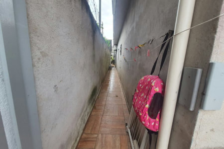 Casa com 3 dormitórios à venda, 259 m² por R$ 450.000,00 - Caruara - Santos/SP