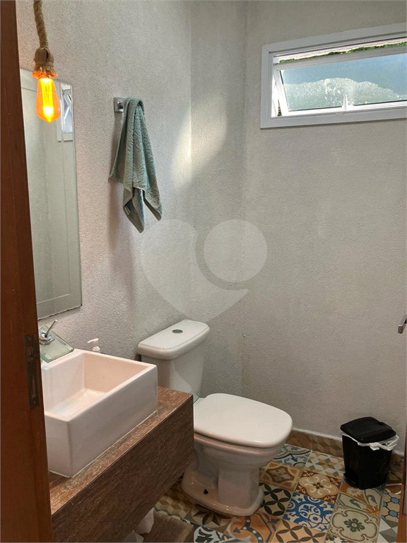 Casa à venda com 4 quartos, sendo 2 suítes,  no condomínio Morada da Praia, Bertioga - SP