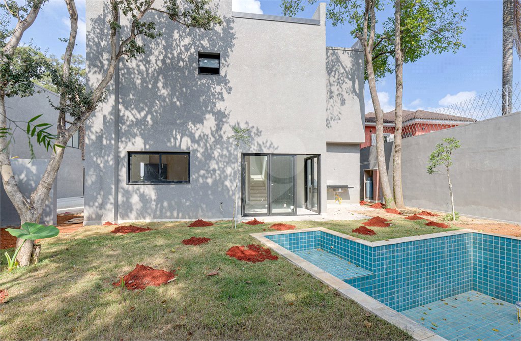 Casa à venda com 4 suítes no condomínio Reserva Robélia, São Paulo - SP