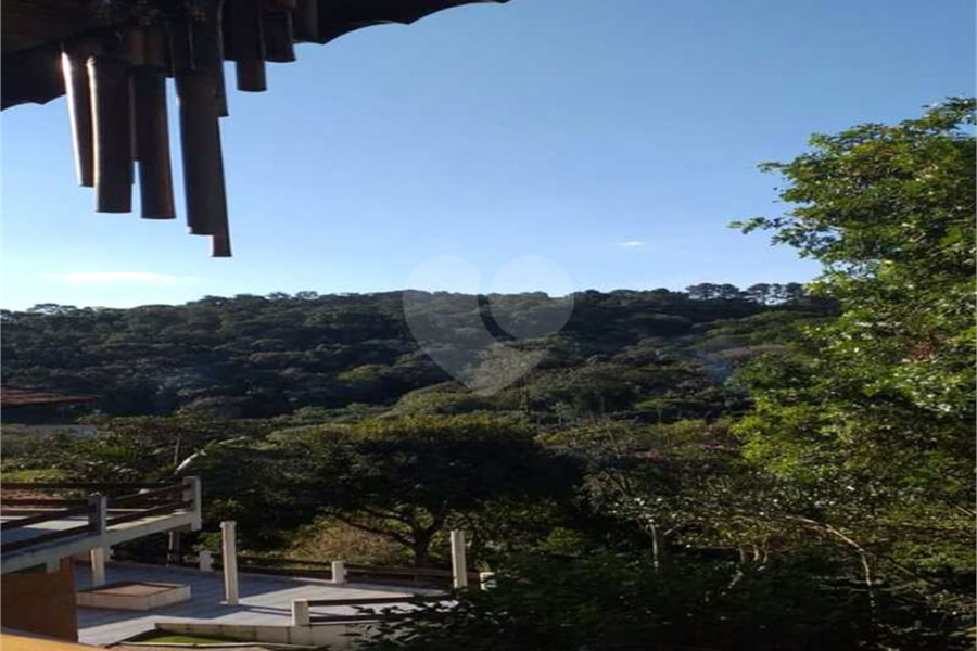 Casa à venda com 4 suítes no condomínio Alpes da Cantareira, Mairiporã - SP