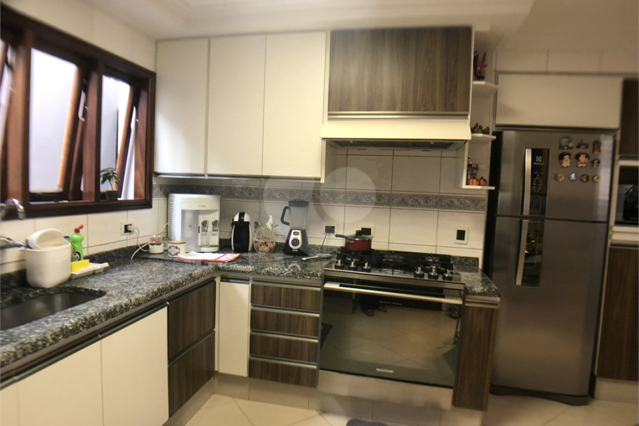 Casa à venda com 4 suítes no condomínio Residencial Floresta, São Paulo - SP