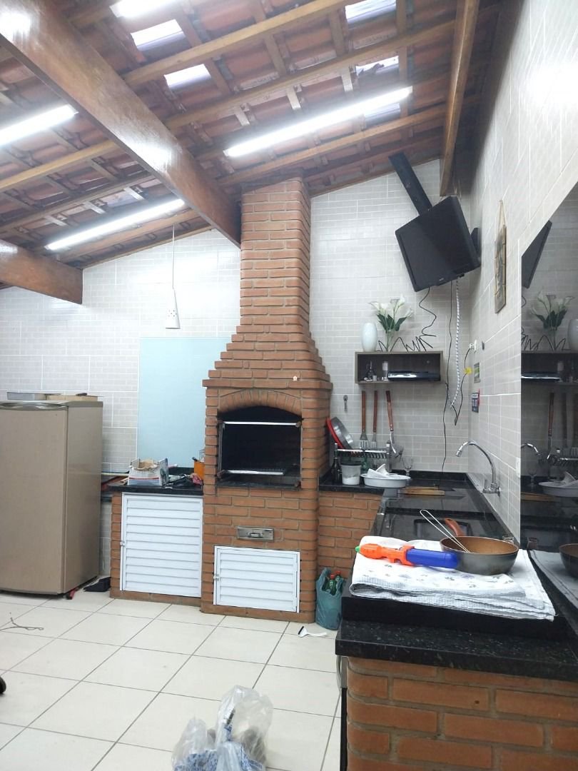 Casa à venda, 204 m² por R$ 585.000,00 - Vila Mateo Bei - São Vicente/SP