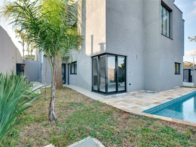 Casa à venda com 4 suítes no condomínio Reserva Robélia, São Paulo - SP