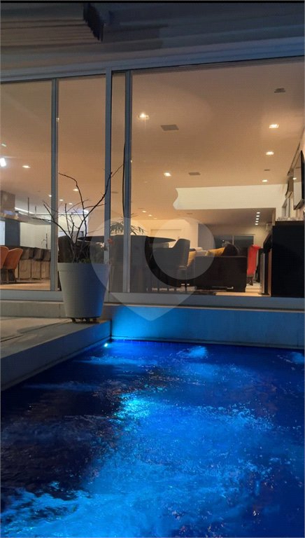 Casa à venda com 4 suítes no condomínio Villaggio Houda, São Paulo - SP