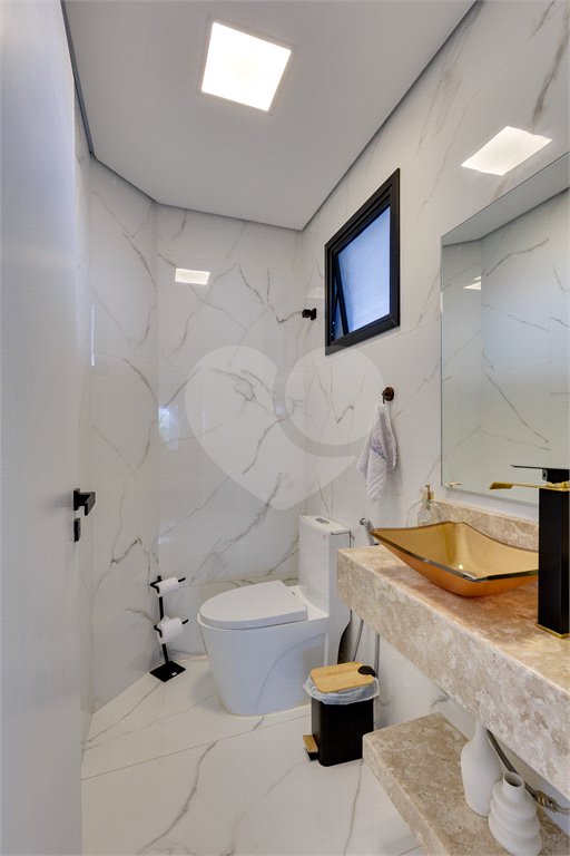 Casa à venda com 4 suítes no condomínio Villa Suiça, São Paulo - SP