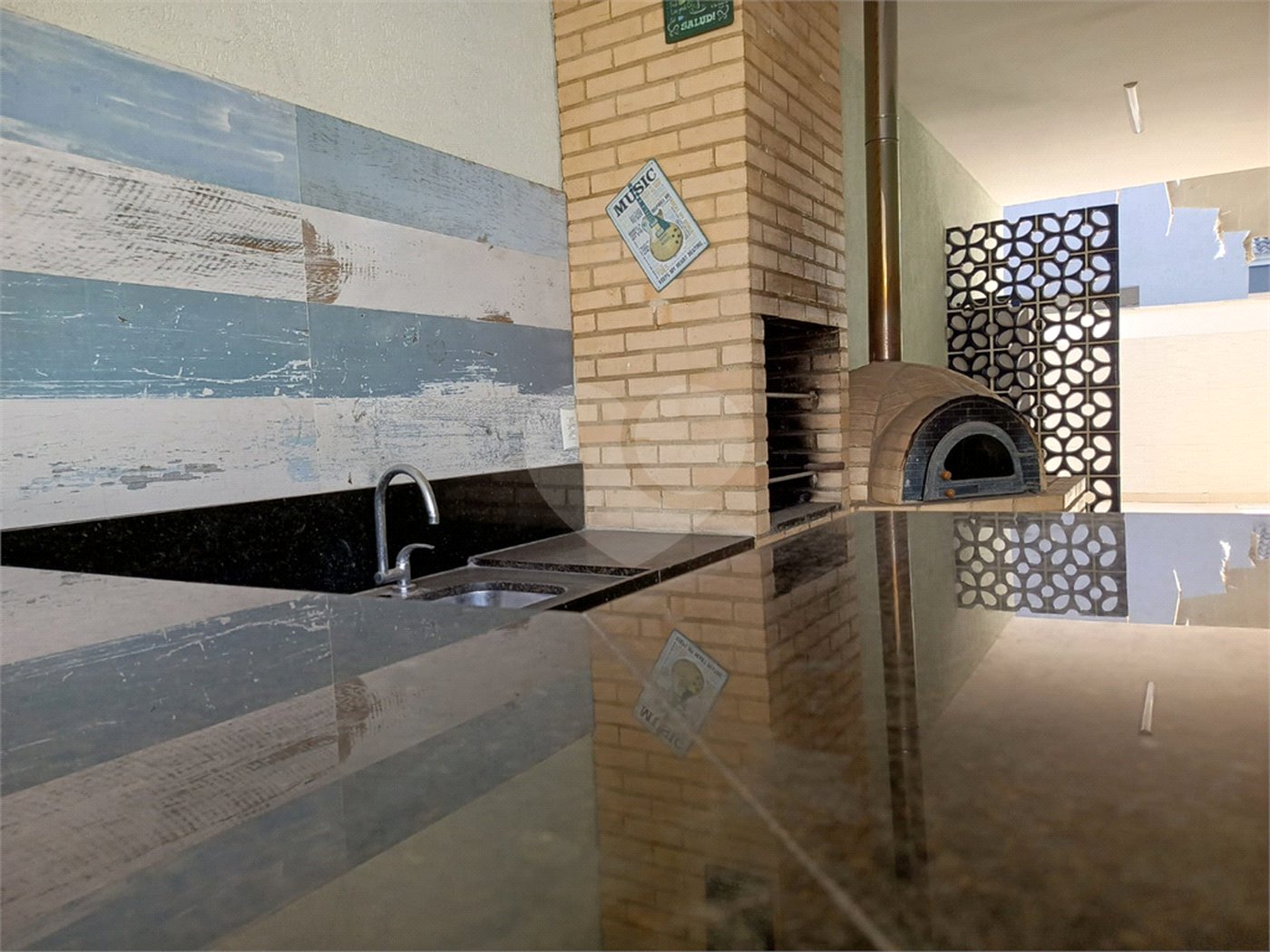 Casa à venda com 4 quartos, sendo 1 suíte, no condomínio Atlantico Sul, Rio de Janeiro - RJ