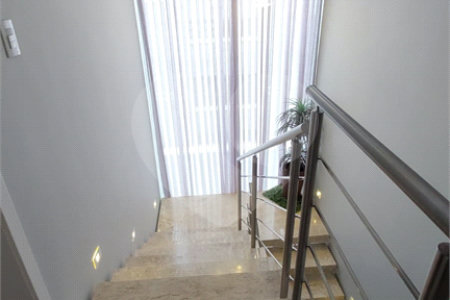 Casa à venda com 4 suítes no condomínio Figueira Garden, Atibaia - SP