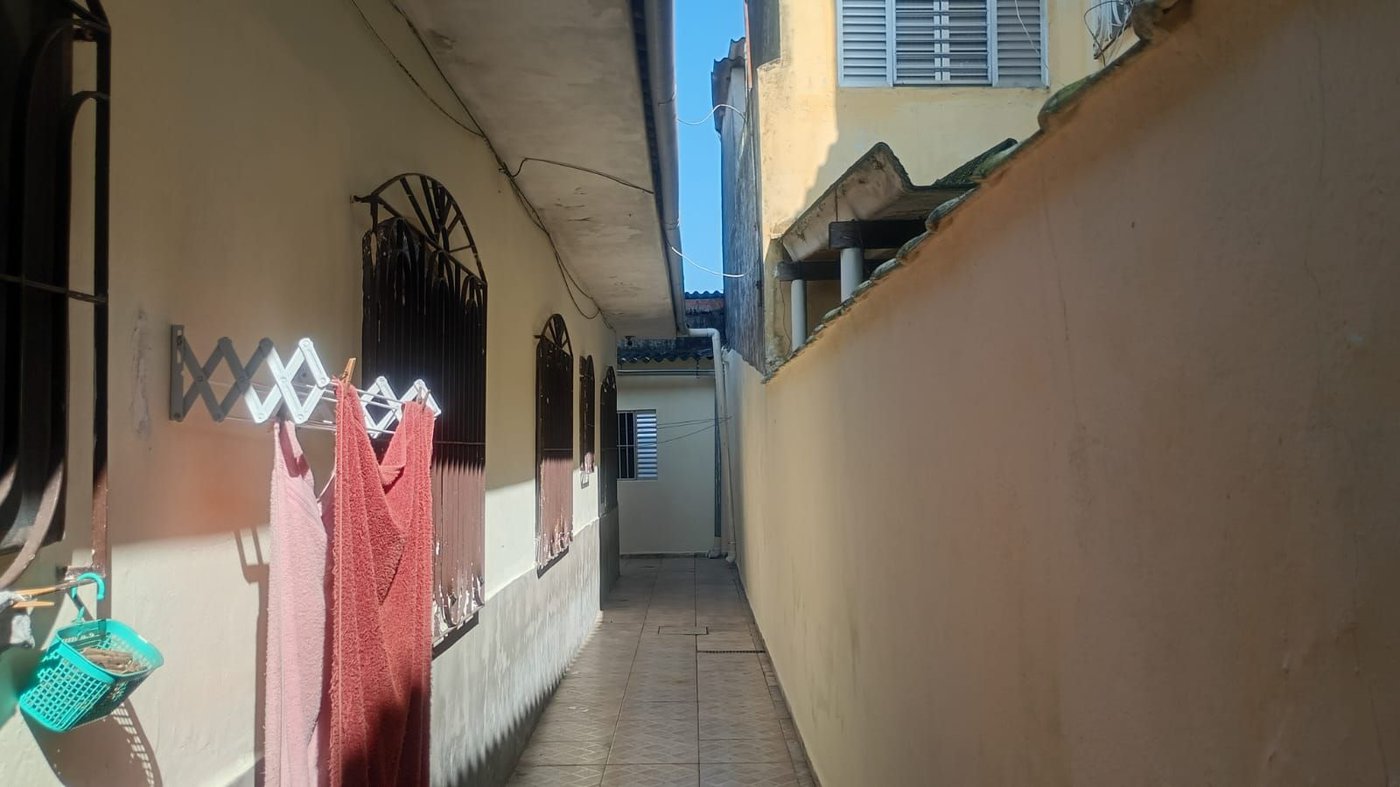 Casa com 3 dormitórios à venda, 140 m² por R$ 425.000,00 - Parque Bitaru - São Vicente/SP
