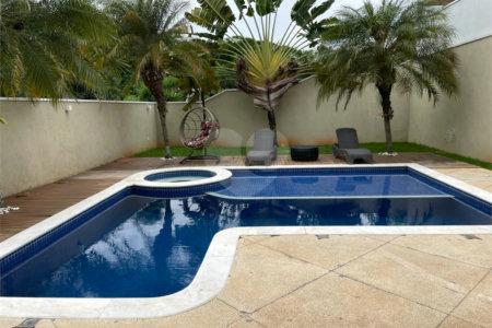 Casa à venda com 4 suítes no condomínio Basel, Campinas - SP