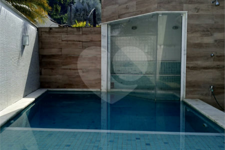 Casa à venda com 4 quartos, sendo 1 suíte, no condomínio Atlantico Sul, Rio de Janeiro - RJ