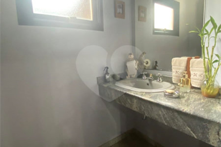 Casa à venda com 4 suítes no condomínio Vale da Santa Fé, Vinhedo - SP