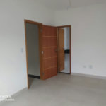 Sobrado com 3 dormitórios à venda, 107 m² por R$ 825.000,00 - Estuário - Santos/SP