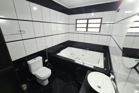 Casa com 3 dormitórios à venda, 150 m² por R$ 960.000,00 - Macuco - Santos/SP