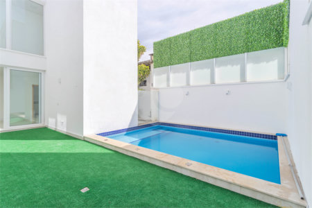 Casa à venda com 4 suítes no condomínio Villagio Quadrifolio, São Paulo - SP