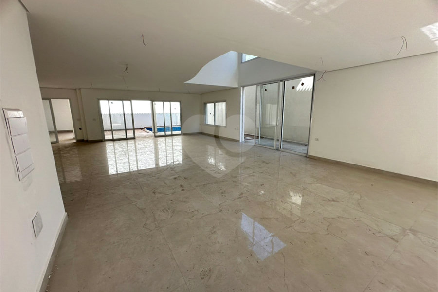 Casa à venda com 4 suítes no condomínio Villaggio Houda, São Paulo - SP