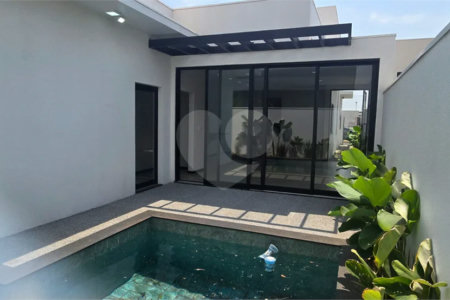 Casa à venda com 5 suítes no condomínio Parque Faber IV, São Carlos - SP