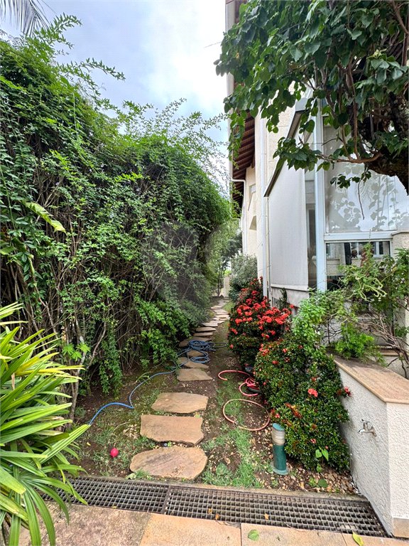 Casa à venda com 5 suítes no condomínio Residencial Bougainville, Campinas - SP