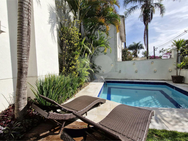 Casa à venda com 4 quartos, sendo 3 suítes,  no condomínio Le Lis Vert Village, São Paulo - SP