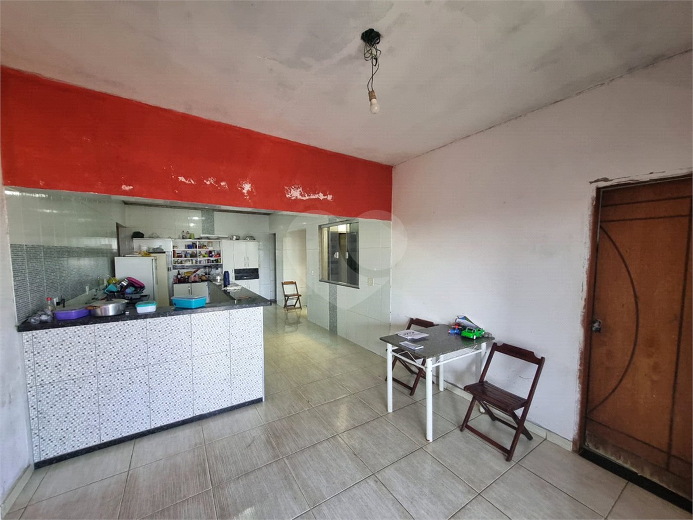 Sobrado 3 quartos e área comercial em baixo.