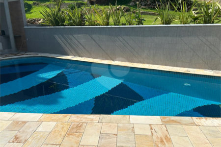 Casa à venda com 4 suítes no condomínio Jardim Paulista I, Vinhedo - SP