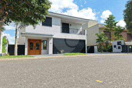 Casa à venda com 4 suítes no condomínio Alphaville Dom Pedro 3, Campinas - SP
