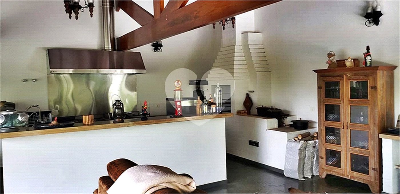 Casa à venda com 4 suítes no condomínio Alpes da Cantareira, Mairiporã - SP