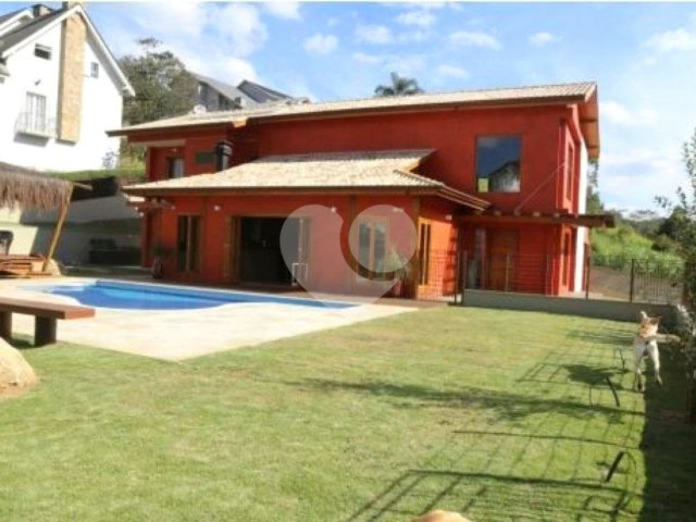 Casa à venda com 4 suítes no condomínio Suíça da Cantareira, Mairiporã - SP