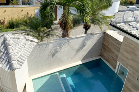Casa à venda com 4 quartos, sendo 1 suíte, no condomínio Atlantico Sul, Rio de Janeiro - RJ