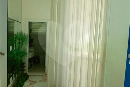 Casa à venda com 3 suítes no condomínio Figueira Garden, Atibaia - SP