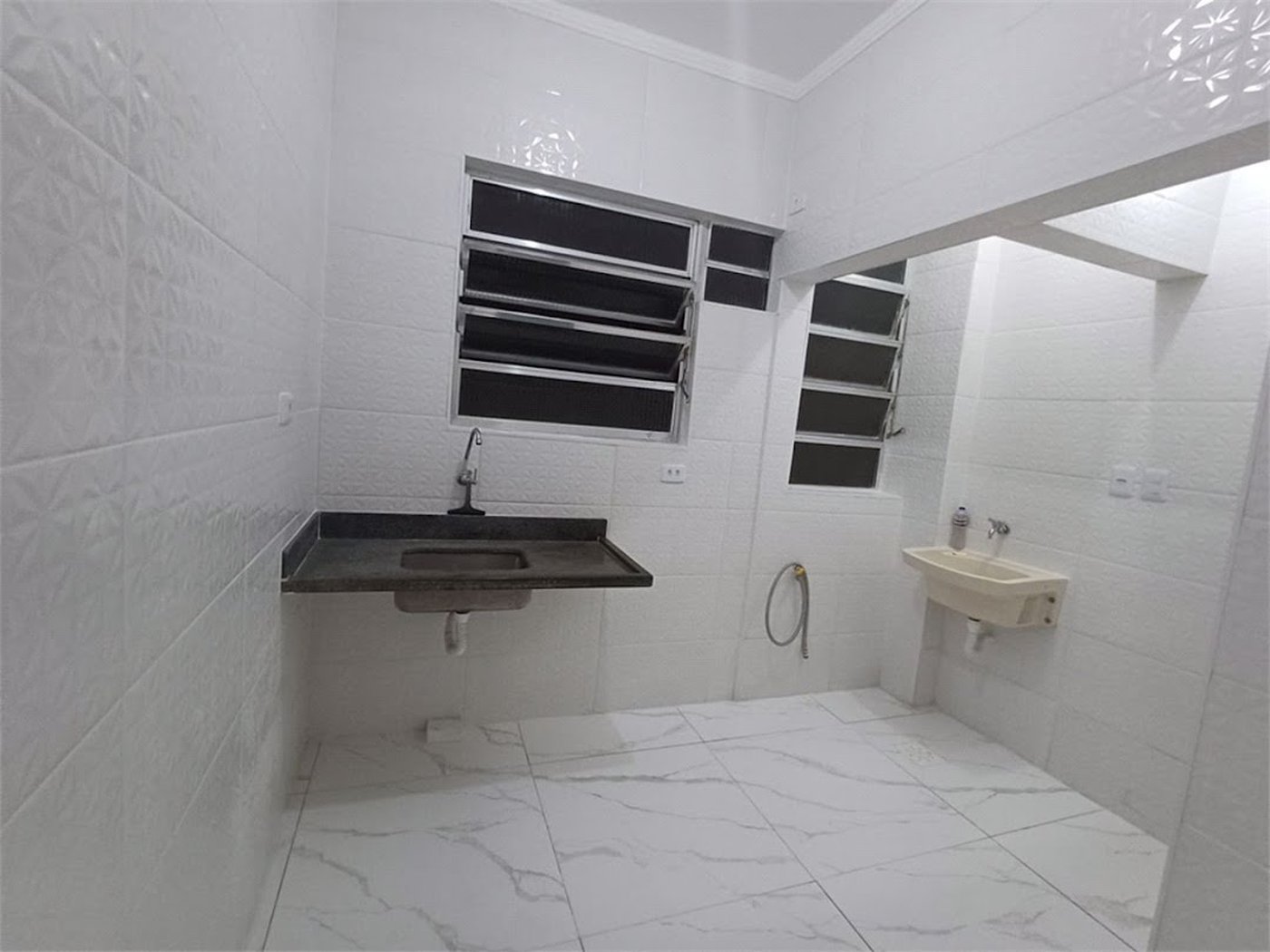 Apartamento com 2 dormitórios à venda, 56 m² por R$ 515.000,00 - José Menino - Santos/SP