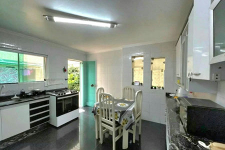 Casa com 3 dormitórios à venda, 210 m² por R$ 1.200.000,00 - Encruzilhada - Santos/SP