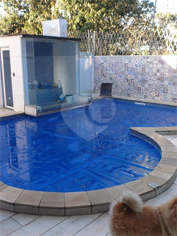 Casa à venda com 4 suítes no condomínio Parque da Figueiras, Mogi das Cruzes - SP