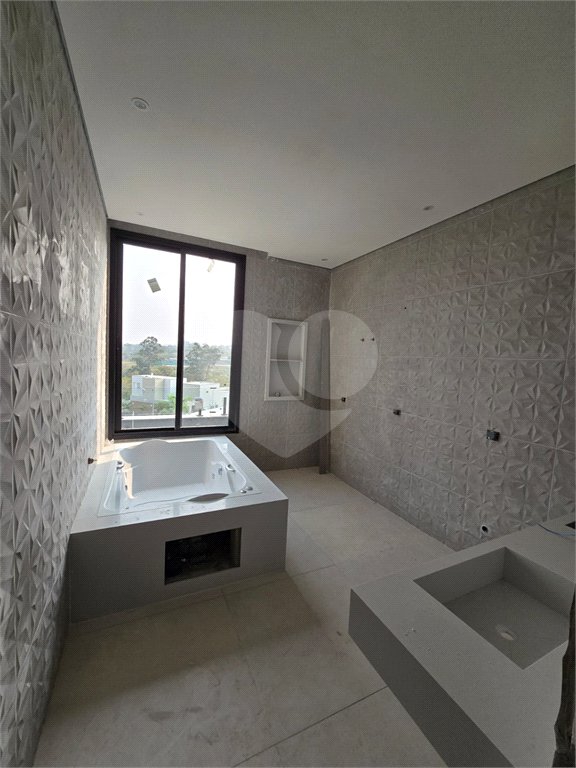 Casa à venda com 4 quartos, sendo 3 suítes, no condomínio Alphaville Nova Esplanada 4, Votorantim - SP