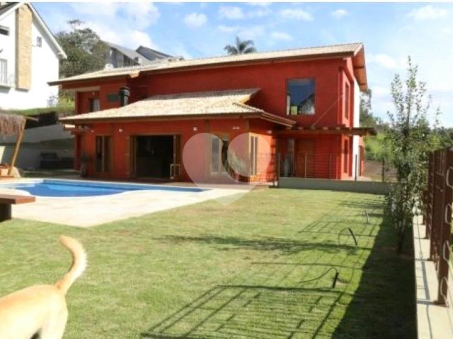 Casa à venda com 4 suítes no condomínio Suíça da Cantareira, Mairiporã - SP