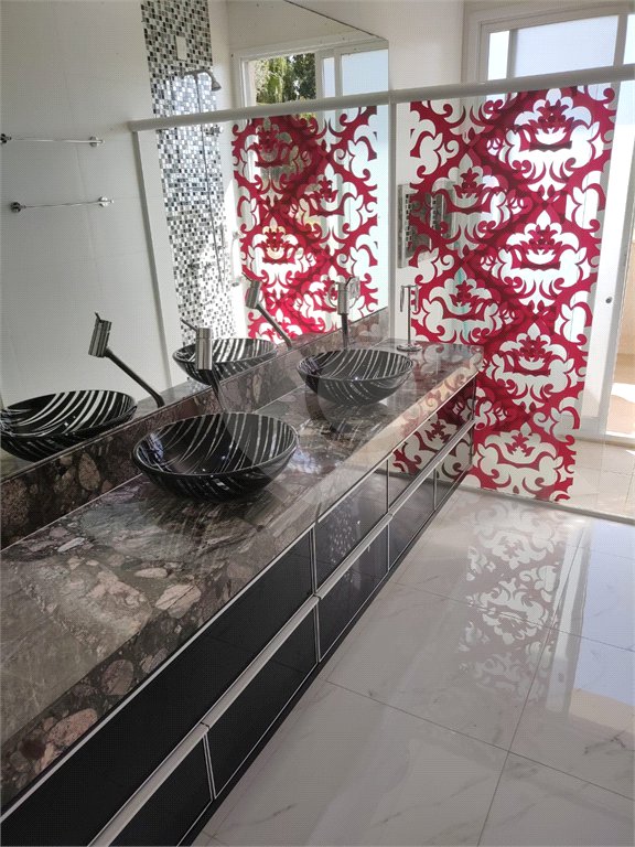 Casa à venda com 3 suítes no condomínio Estância Marambaia, Vinhedo - SP