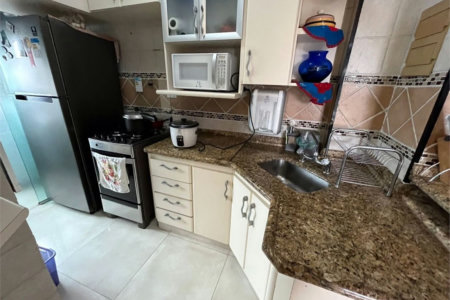 Apartamento Residencial à venda, Jardim Três Marias, Guarujá - AP0583.