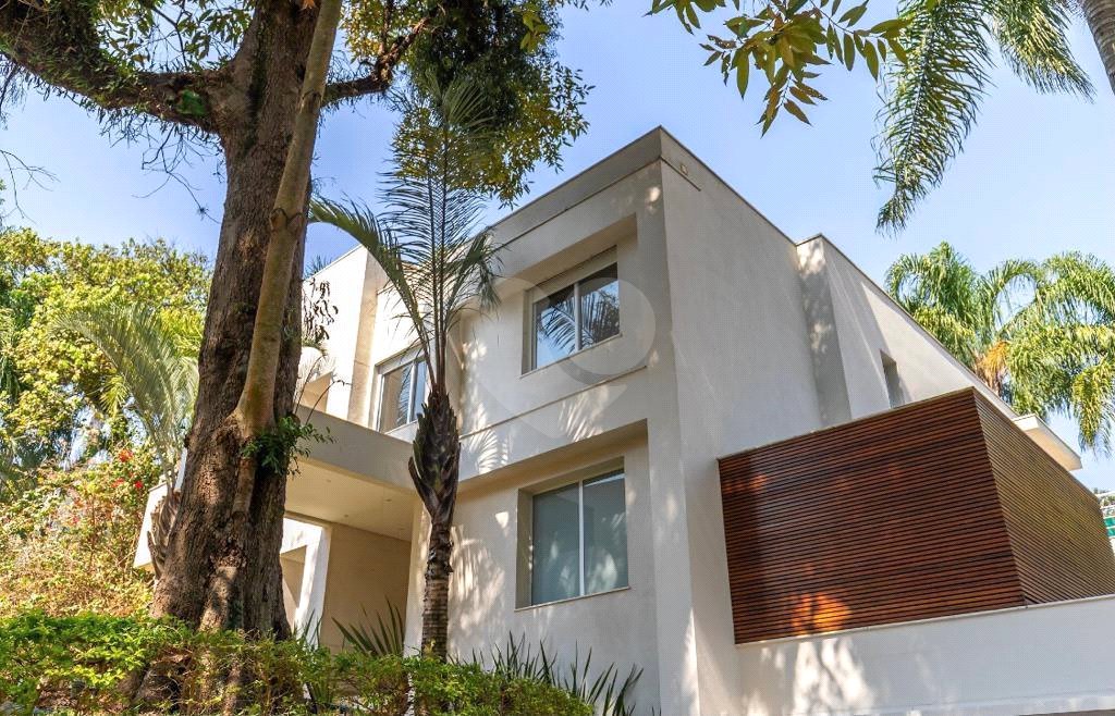 Casa à venda com 4 suítes no condomínio Vila Alba, São Paulo - SP