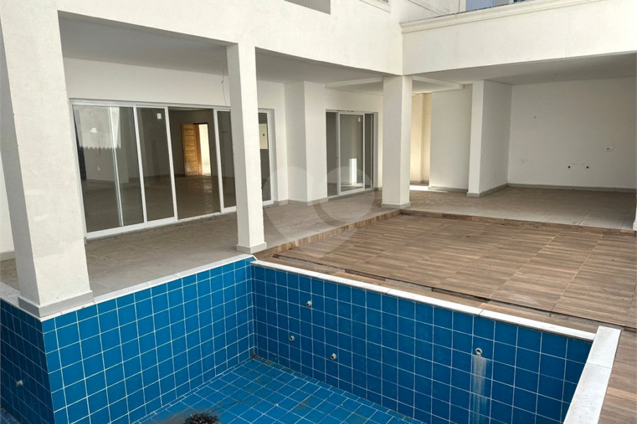 Casa à venda com 4 suítes no condomínio Villaggio Houda, São Paulo - SP